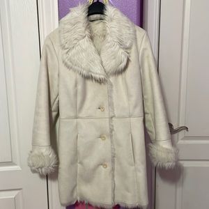 Woman’s shell color coat size medium with fur inside and trim